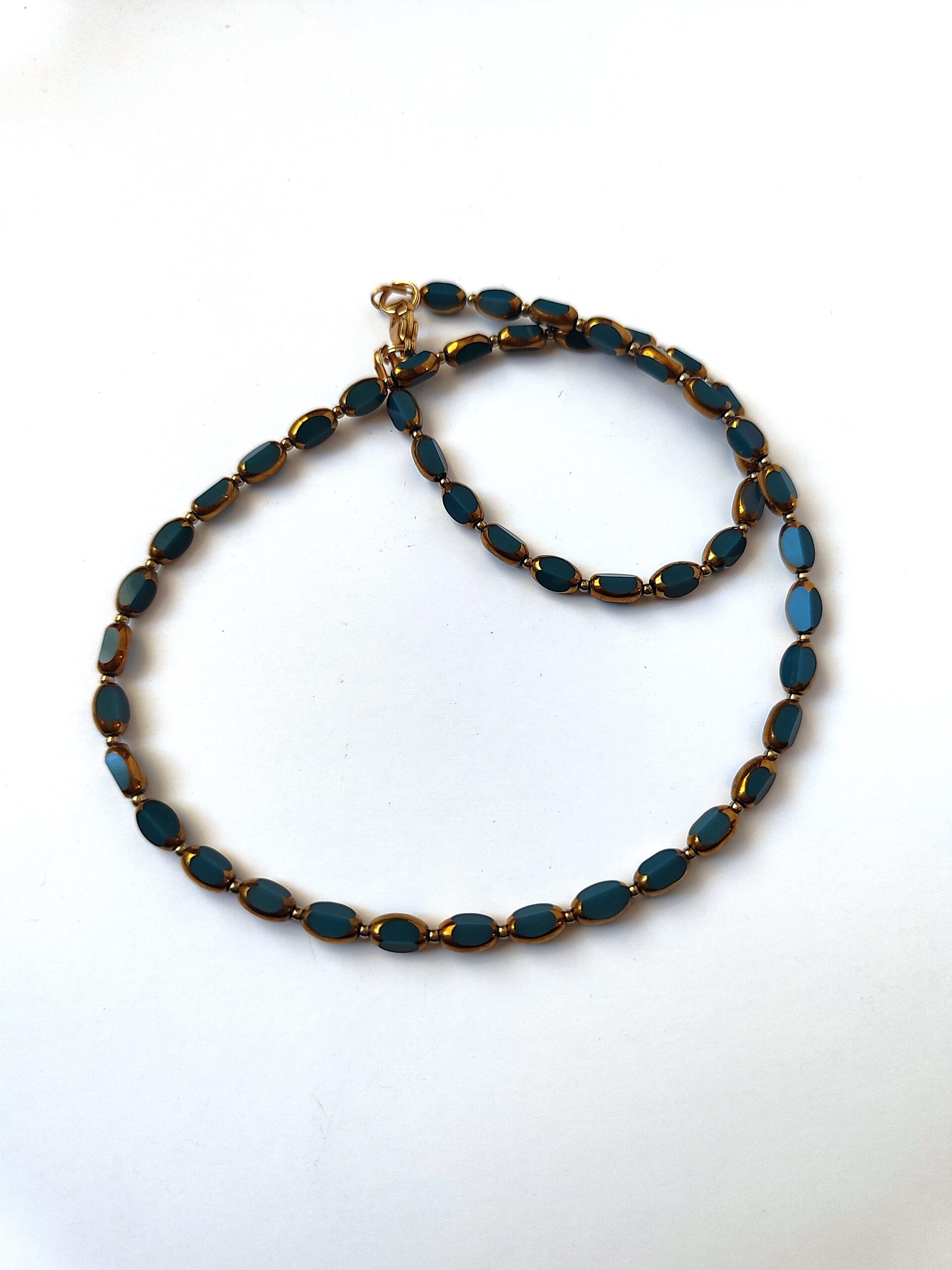 Stiklo ir hematito vėrinys