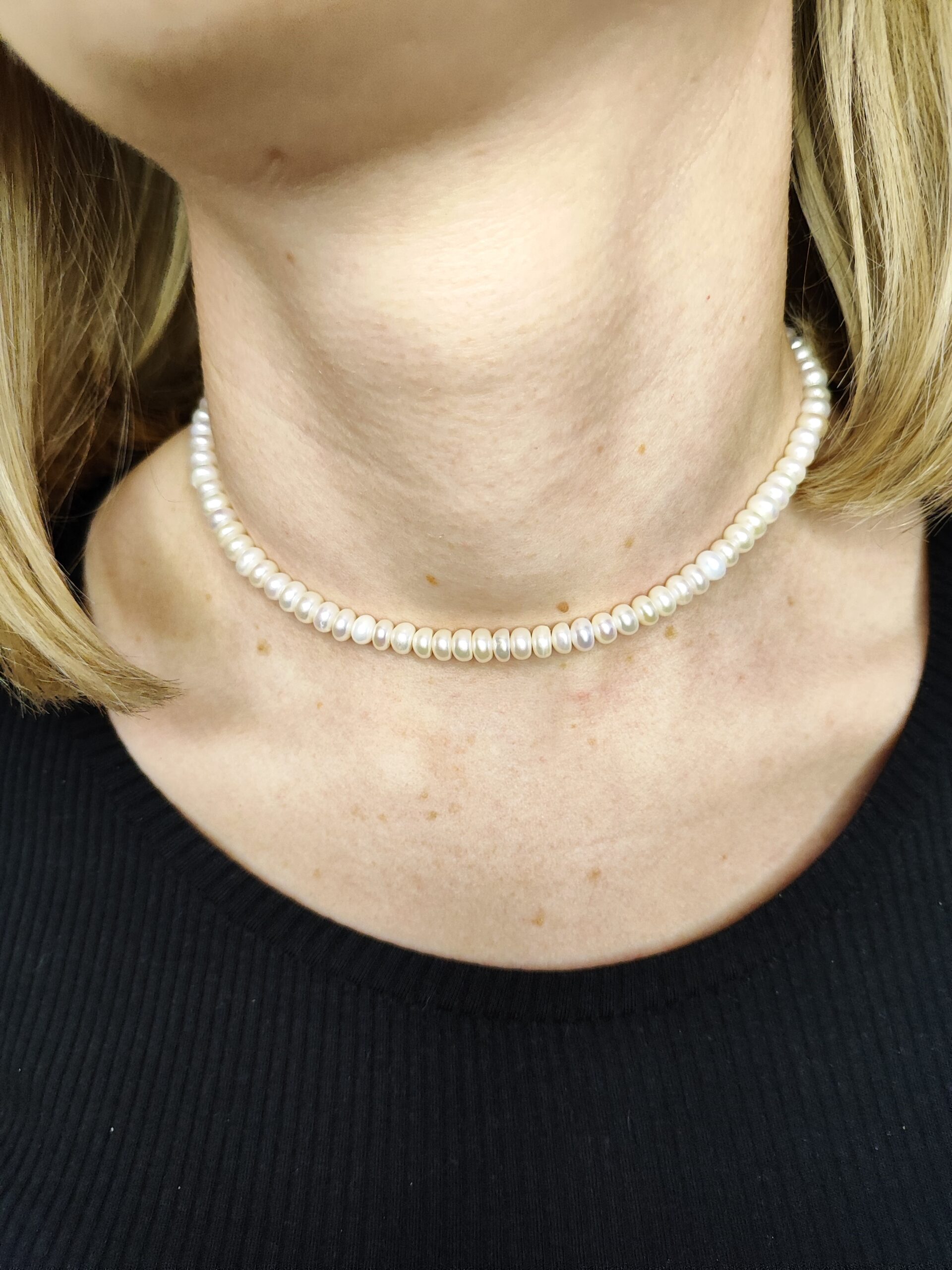 Upinių perlų vėrinys