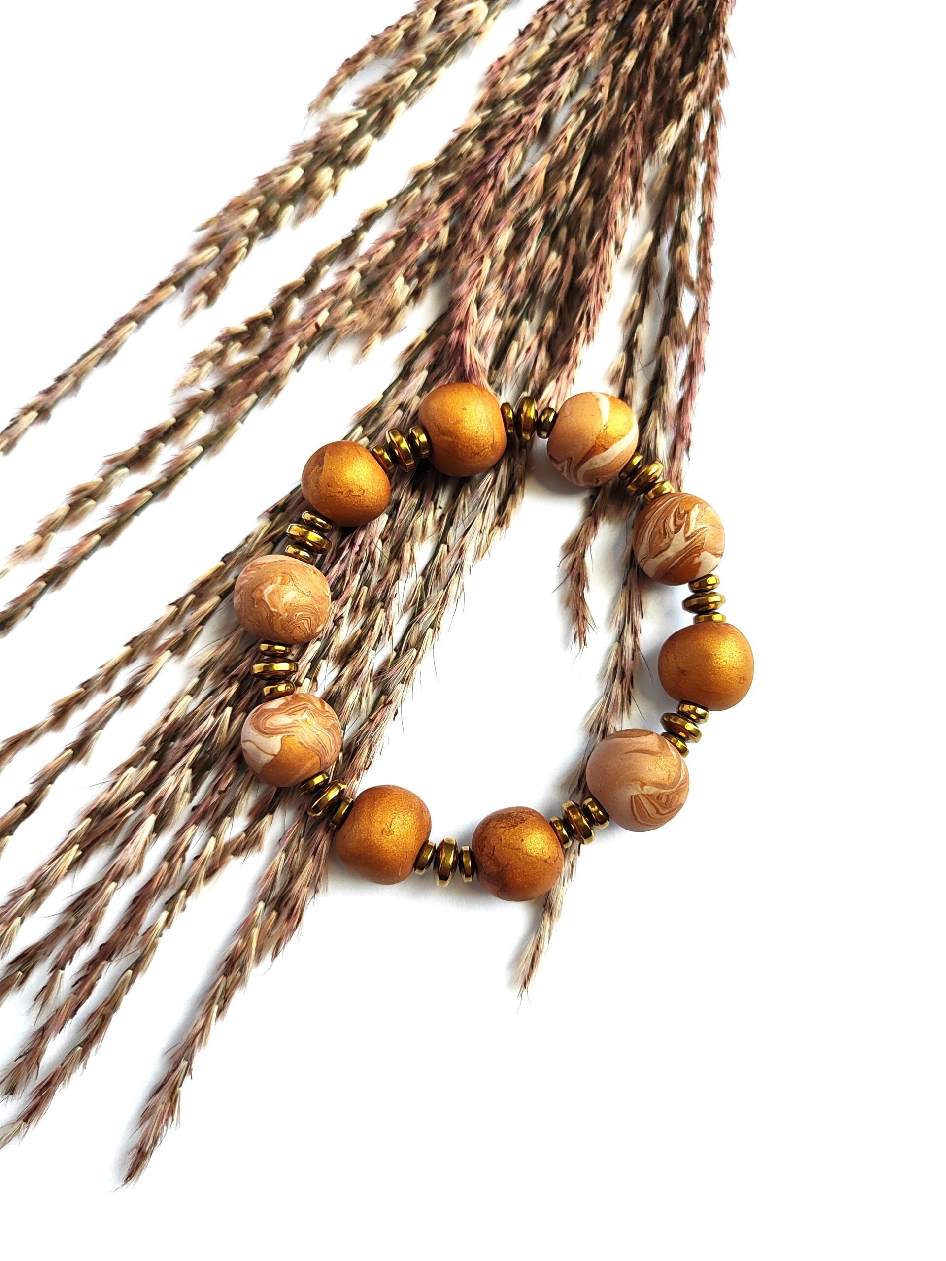 Vienetinė aukso spalvos apyrankė