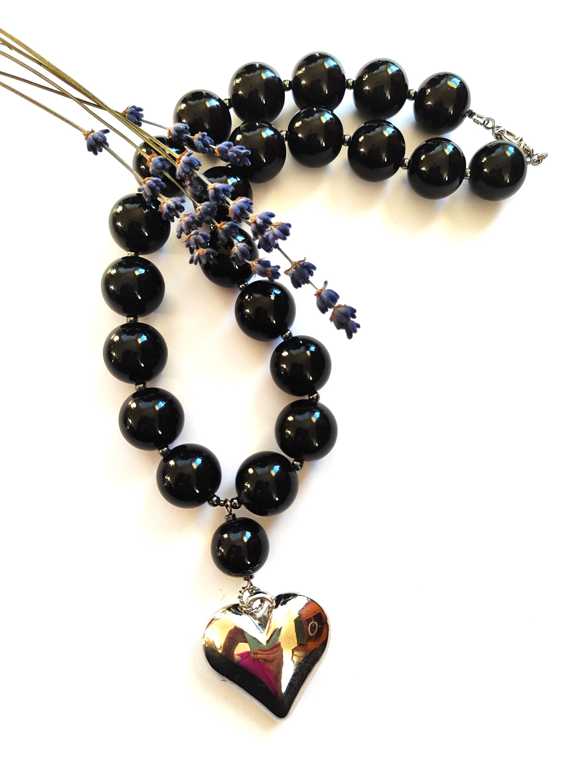 Stambus onikso vėrinys