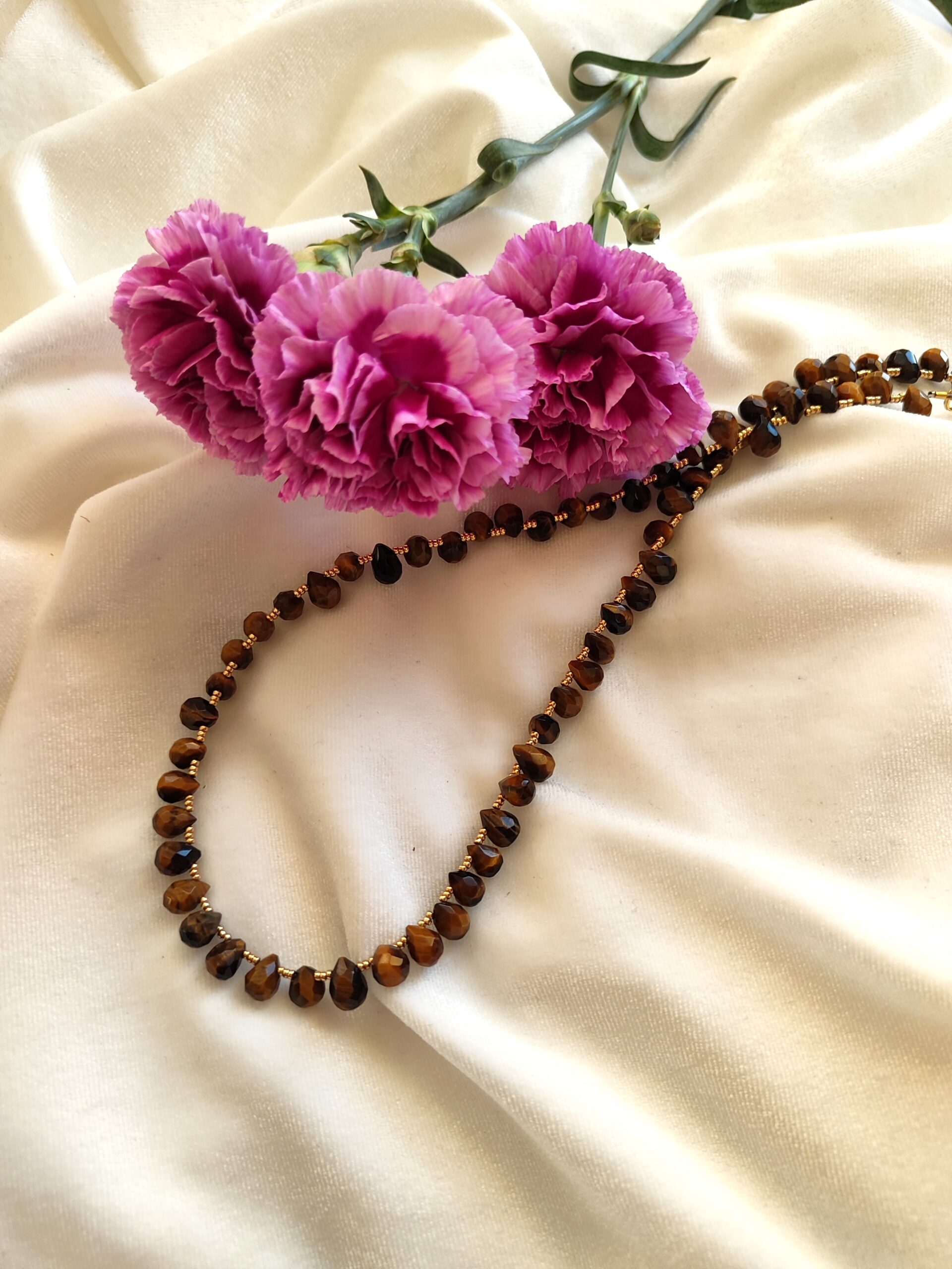 Tigro akies lašelių vėrinys