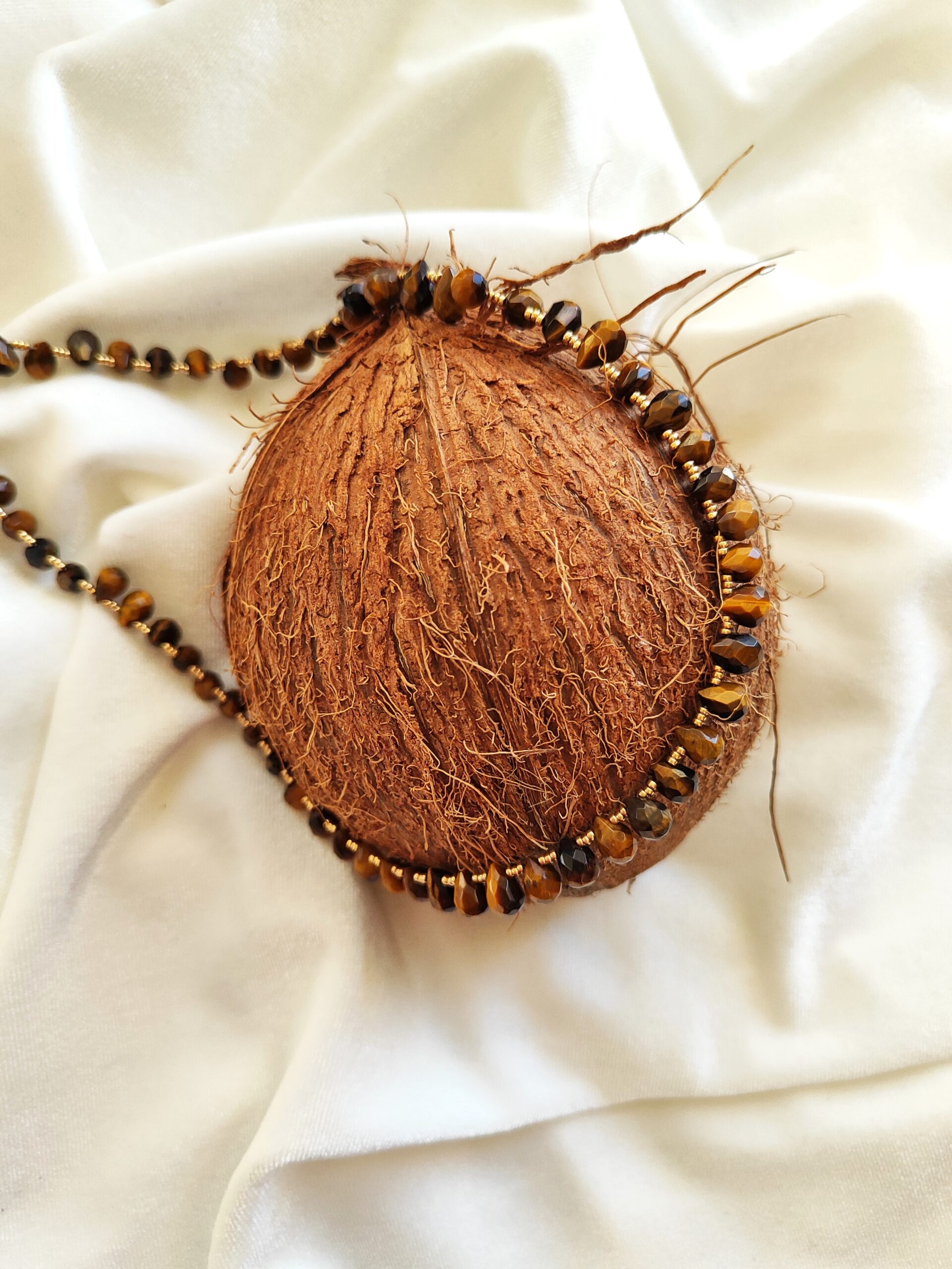 Tigro akies lašelių vėrinys