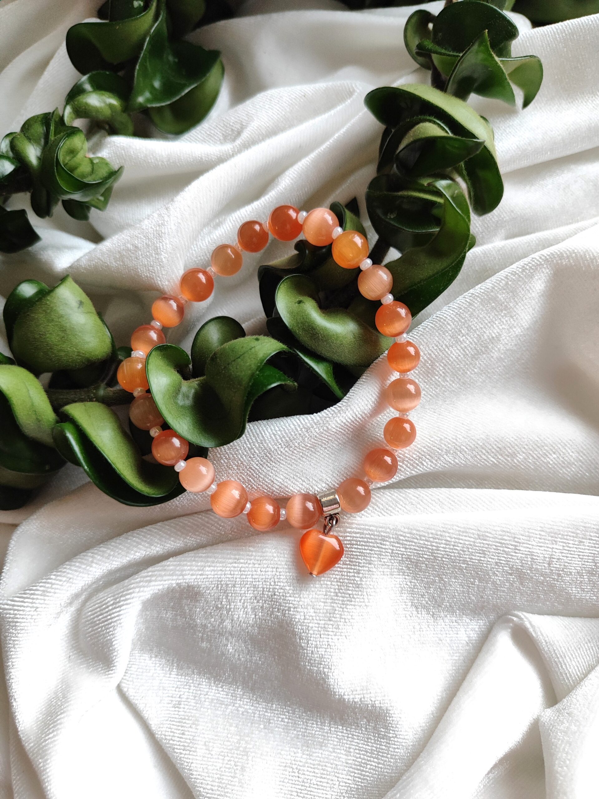 Persikinės spalvos katės akies apyrankė