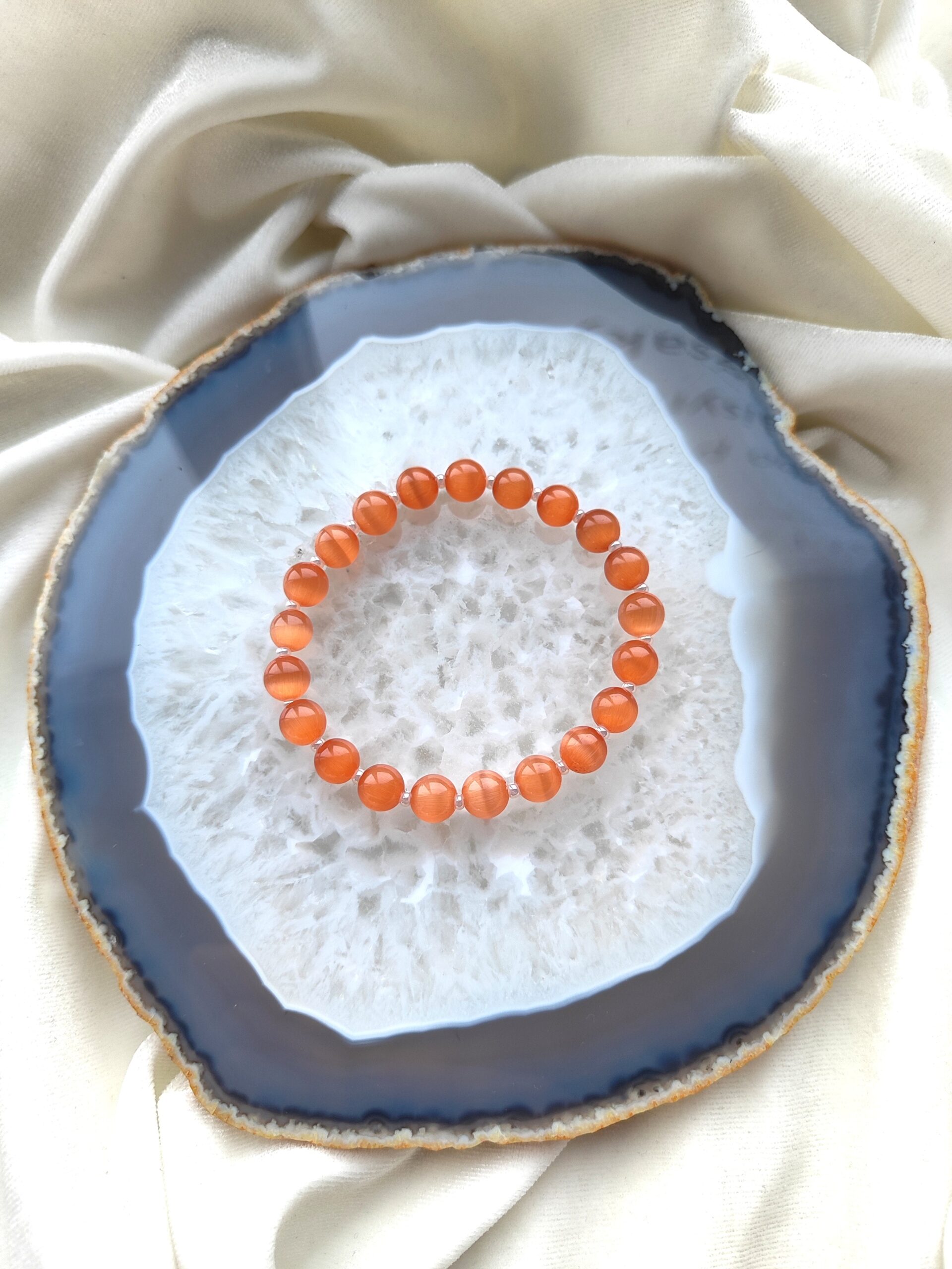 Persikinės spalvos katės akies apyrankė