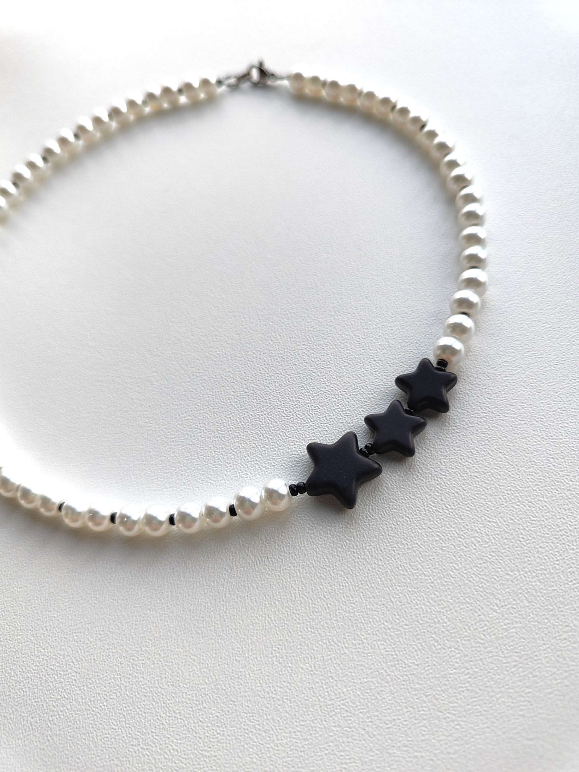 Perlų vėrinys su žvaigždėmis