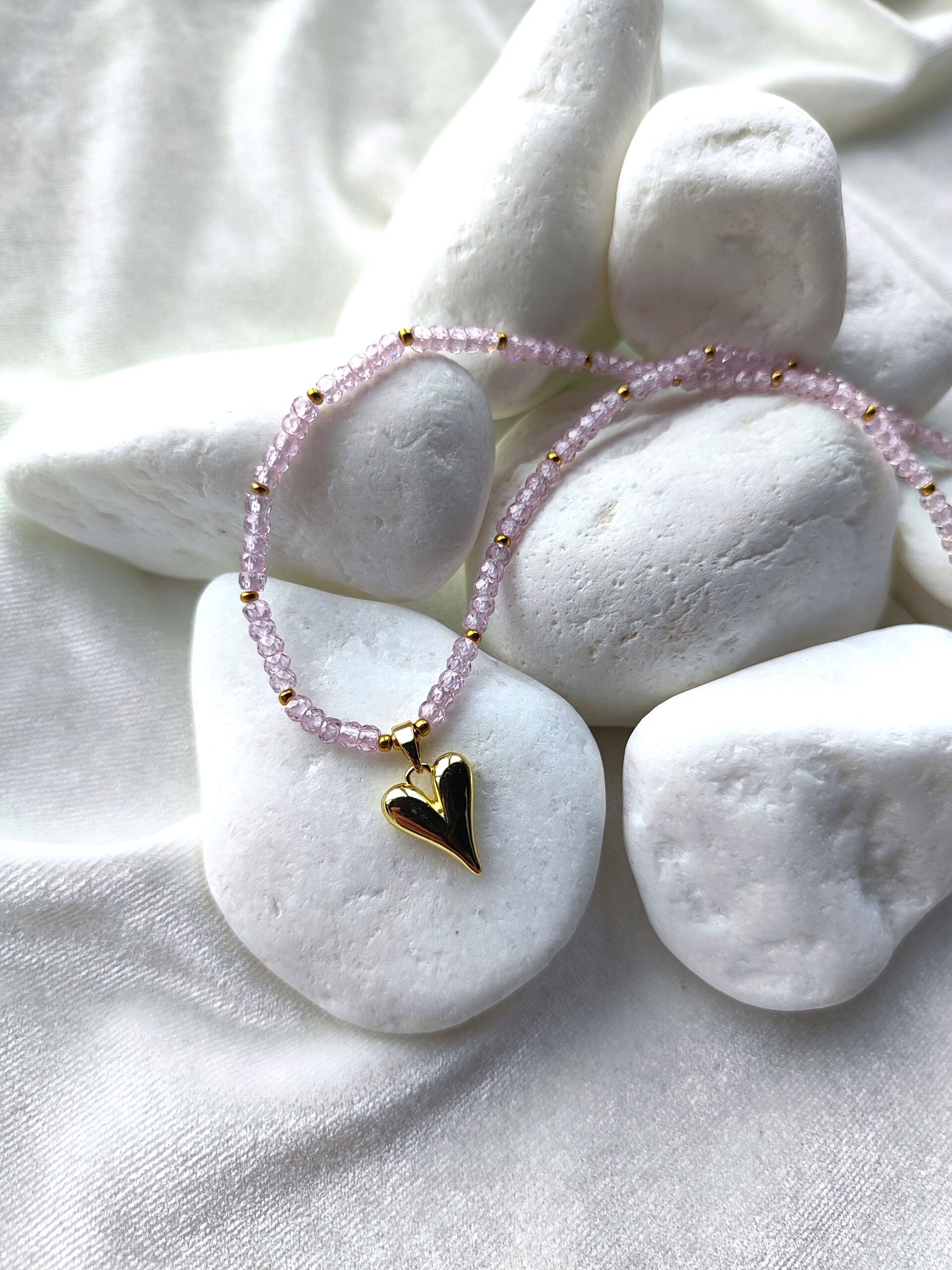 Rožinės spalvos cirkonio vėrinys su pakabuku